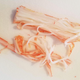 A shredded crab stick, with long strings pulled out